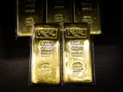 Gold heads for first weekly gain since May on easing Fed outlook