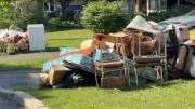 Ottawa residents face difficult flood clean-up as garbage piles up