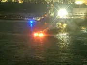 Seven Americans rescued from burning boat on Detroit River